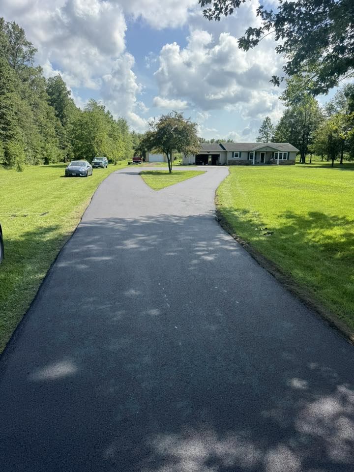 Beautifully split residential driveway Paul's Asphalt Paving recently finished